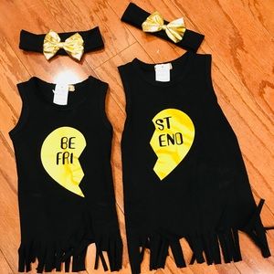 Two toddler girl matching dresses w headband.